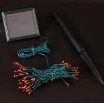 Red LED Solar Powered Lights 50 Light String Green Wire