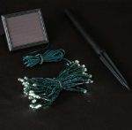 Warm White LED Solar Powered Lights 50 Light String Green Wire