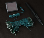 Warm White LED Solar Powered Lights 100 Light String Green Wire
