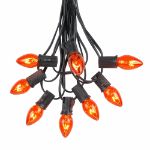 25 Light String Set with Amber/Orange Transparent C7 Bulbs on Black Wire