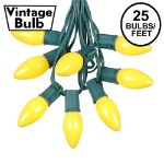 C9 25 Light String Set with Ceramic Yellow Bulbs on Green Wire