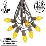 100 C7 String Light Set with Yellow Bulbs on Brown Wire