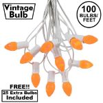 100 C7 String Light Set with Orange Ceramic Bulbs on White Wire