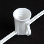 C9 25 Light String Set with Yellow Bulbs on White Wire